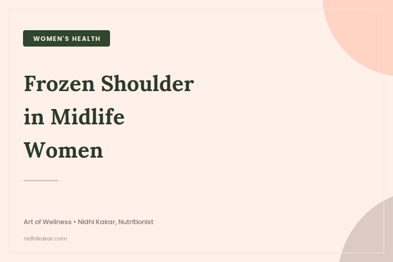 Woman in her 50s holding her shoulder in pain, illustrating frozen shoulder symptoms in midlife women